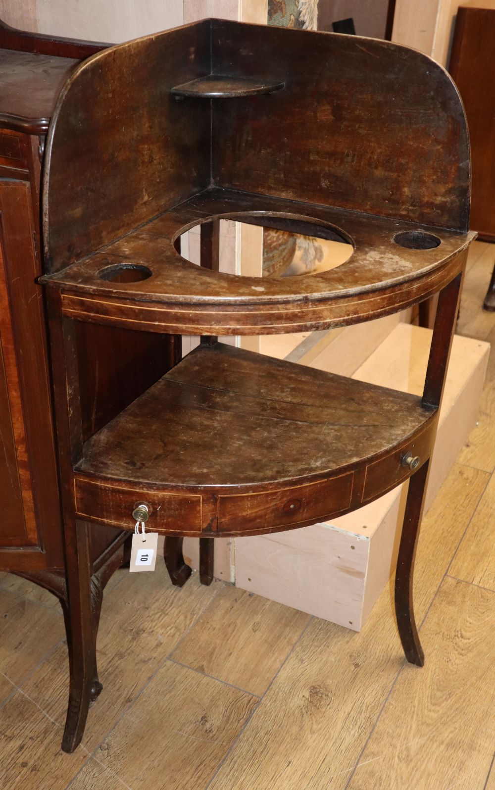 A George III mahogany bowfront washstand, W.60cm, D.41cm, H.106cm